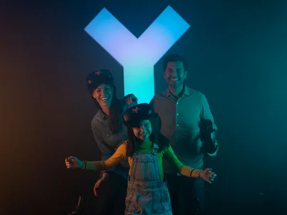 A happy family who has just enjoyed their VR experience at YULLBE.