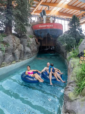 A family floats through the Snorri's Saga attraction at Rulantica water world on tires.