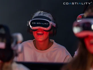 Passenger wearing the Coastiality VR headset.
