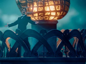Nikola Tesla, member of the Adventure Club of Europe, on one of the Wardenclyffe Towers.