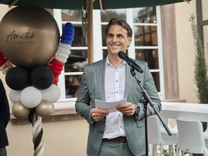 Thomas Mack gives a speech at the opening of the Amité - La Cuisine du Château restaurant. 