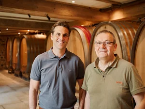 Thomas Mack and Mathieu Kauffmann in the wine cellar of Château Ollwiller.