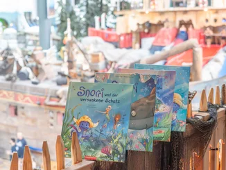 Snorri's children's book series: Four lovingly designed books are lined up in the Rulantica water world.