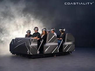 Passengers sit in the Flowryde, equipped with VR headsets.