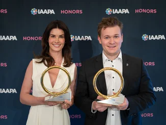 Miriam and Frederik Mack accept the IAAPA Brass Ring Awards on behalf of Europa-Park.