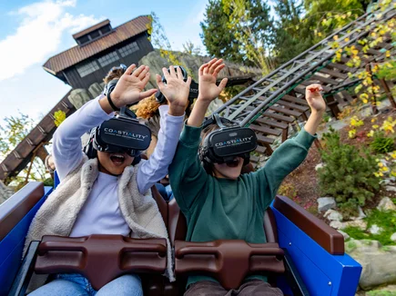 Guests experience the Alpenexpress Coastiality VR attraction at Europa-Park.