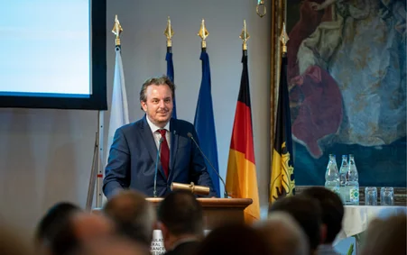 Michael Mack delivers a speech on stage at the ‘Chevalier de la Légion d’honneur’ award ceremony.