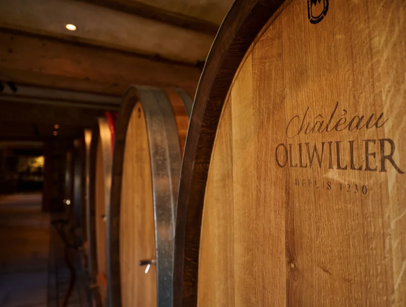 Wine barrels in the wine cellar of Château Ollwiller.