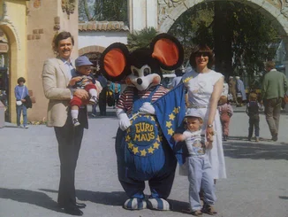 A group photo of Roland and Marianne Mack with Euromaus and the Macks' children, Thomas and Michael, when they were young.
