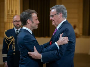 Emmanuel Macron and Roland Mack at the ceremonial presentation of the Order at the Élysée Palace in Paris.