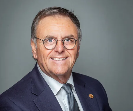 Portrait photograph of Roland Mack.