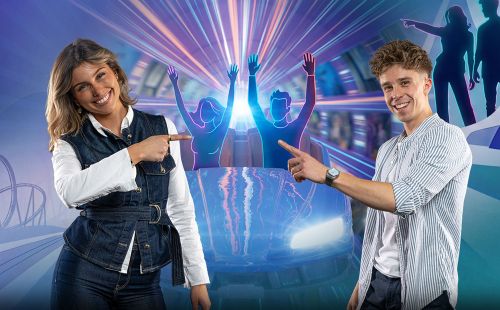 Two real people stand in front of an animated background. In the background, there is a tunnel from which a rollercoaster carrying two passengers hurtles out. The two real people are pointing at the rollercoaster passengers.